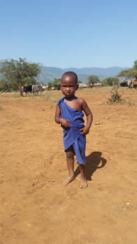 Tanzania - Een masaai kindje tijdens onze indrukwekkende fietstocht in Tanzania
