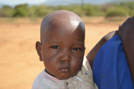 Tanzania - Een masaai kindje tijdens onze indrukwekkende fietstocht in Tanzania