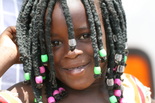 Zambia - meisje met kralen