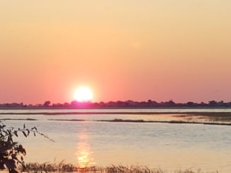 Riksja Namibië & Botswana - Zonsondergang bij Chobe rivier